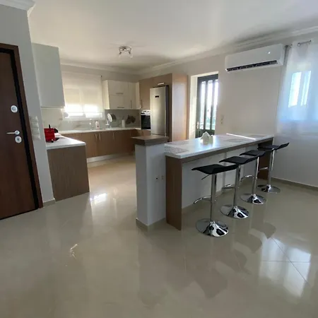 Апартаменты Tasos Cozy 1st Floor Kalligoni